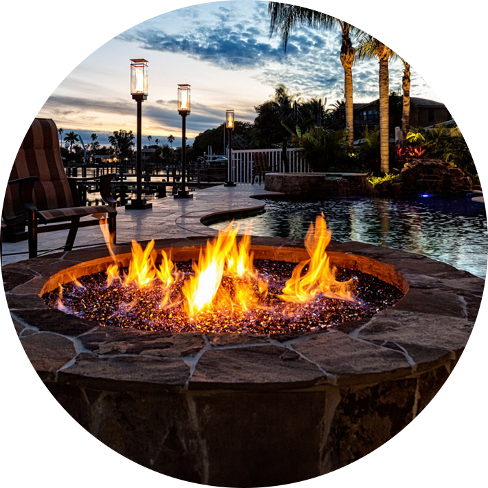 Texas custom pool with built in firepit.